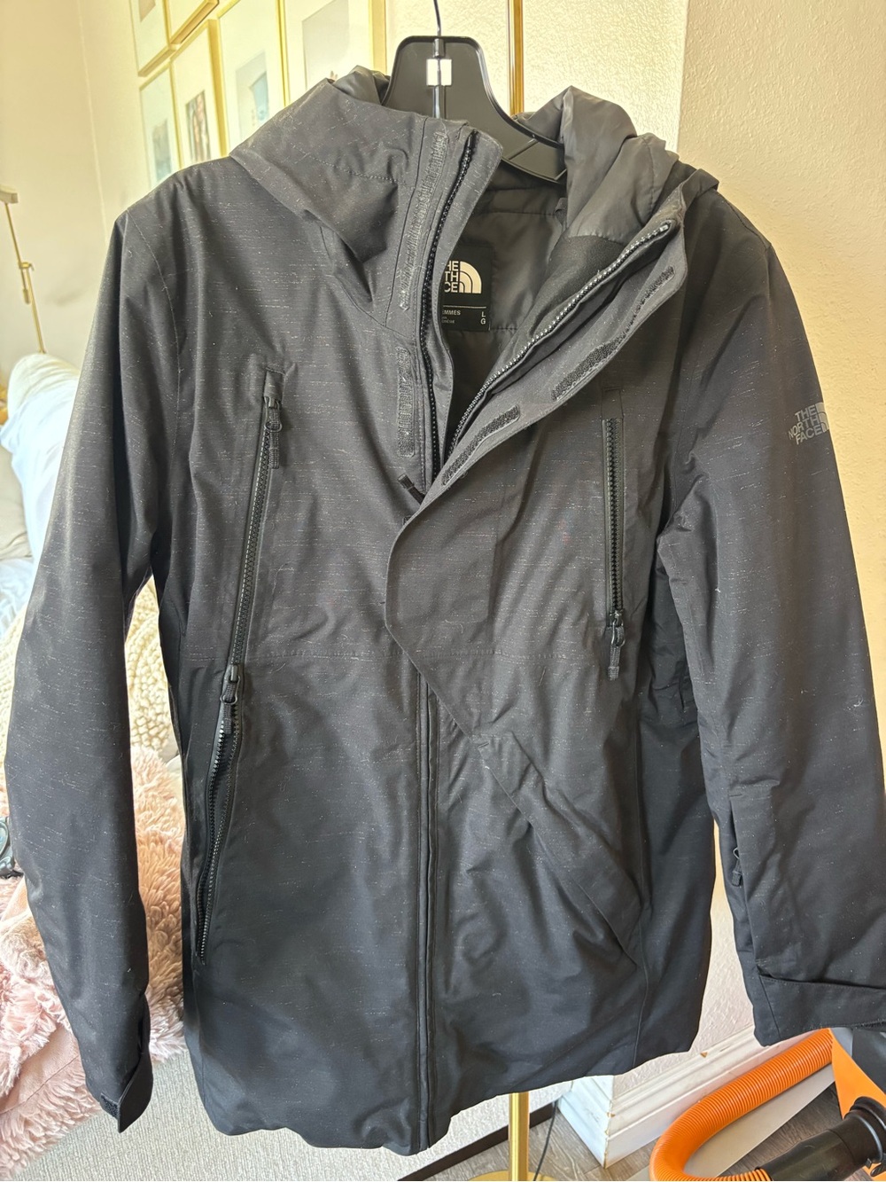 The North Face women’s Black Hooded Raincoat Jacket